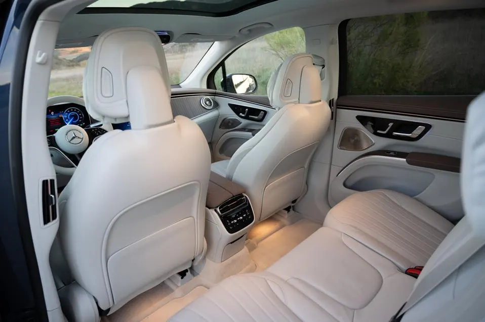 Light leather rear seating inside a Mercedes luxury SUV